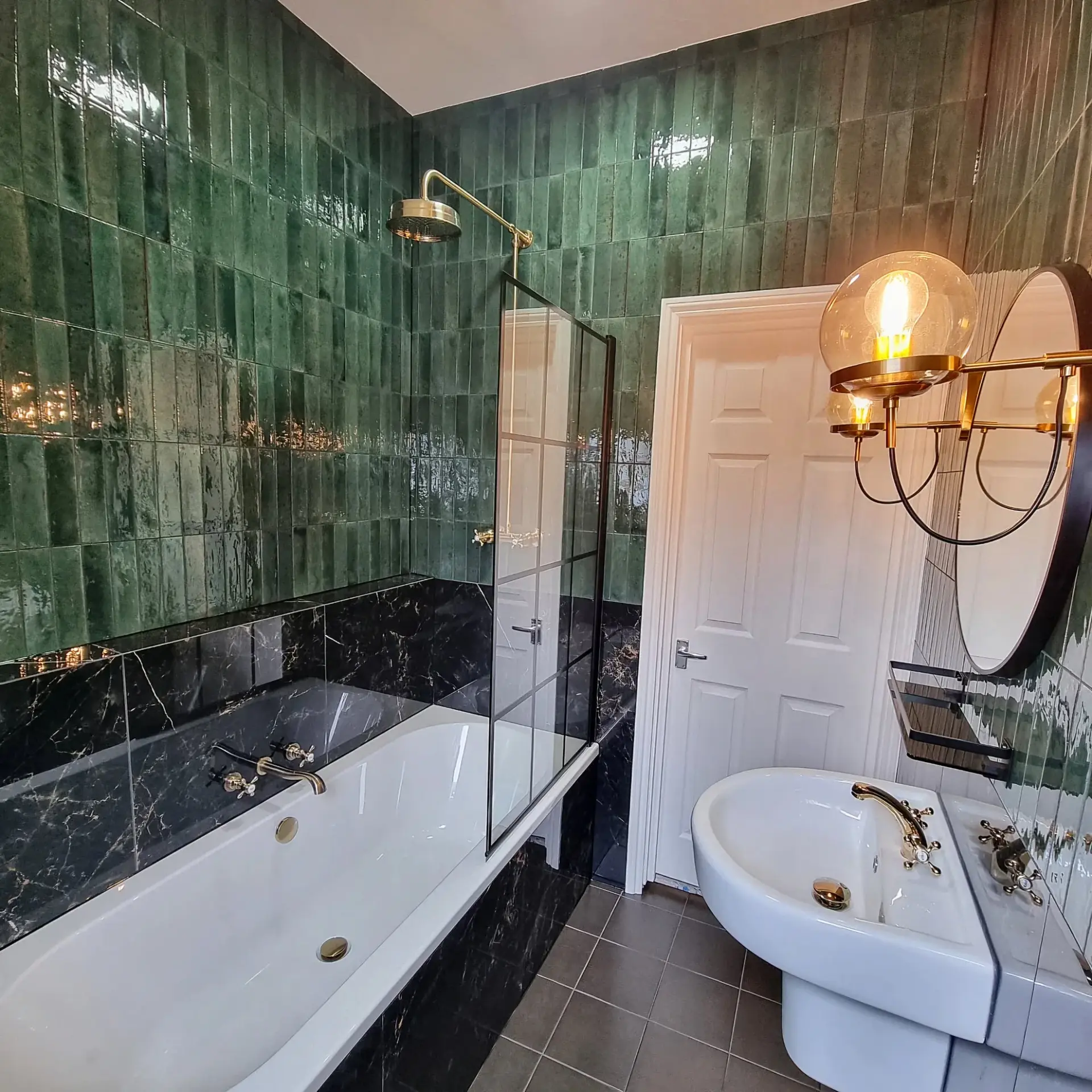 Luxury bathroom renovation by Lucian Bathrooms featuring modern tiling and premium fixtures in North London