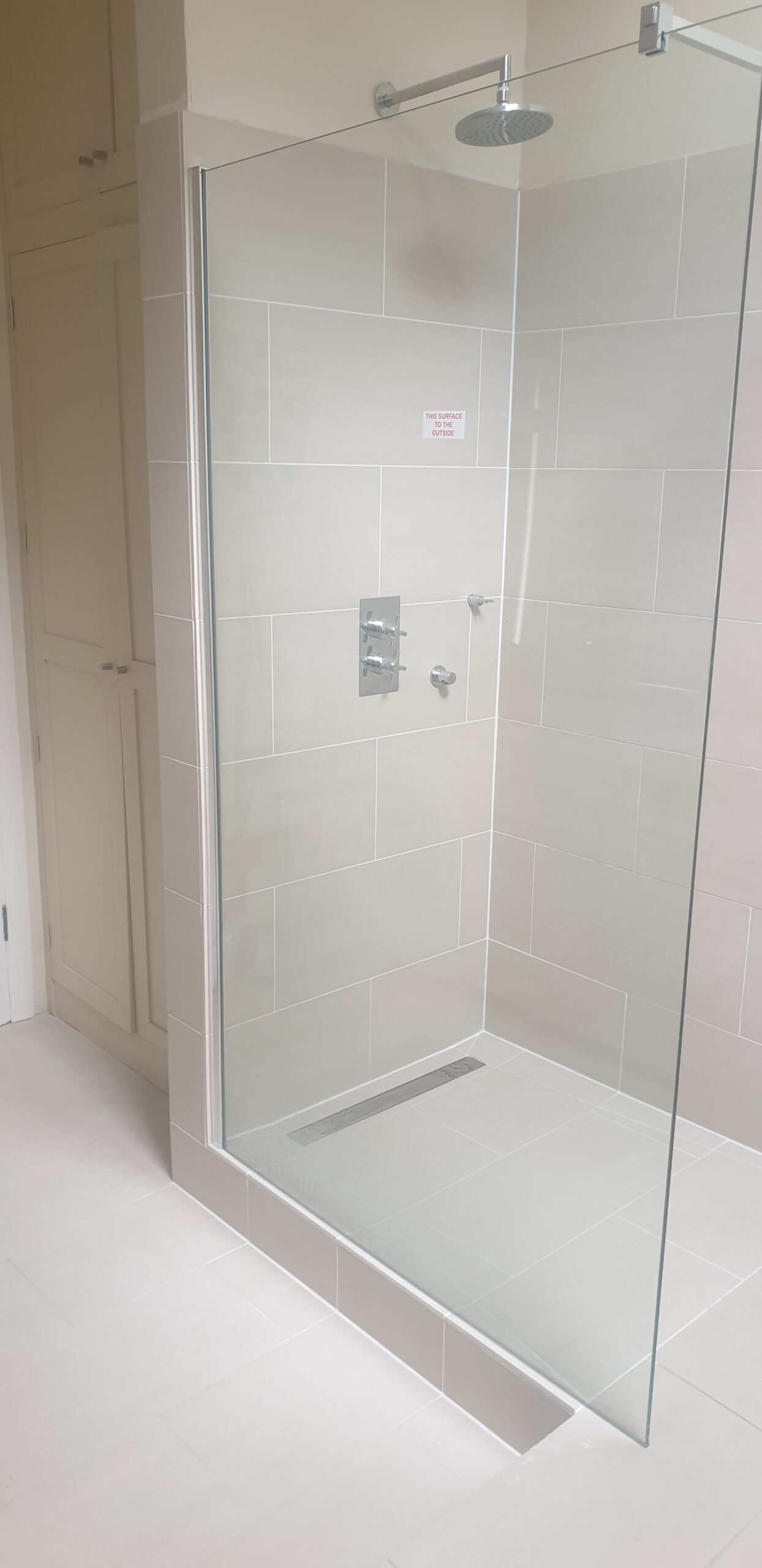 Finished wet room shower enclosure — what clients usually see