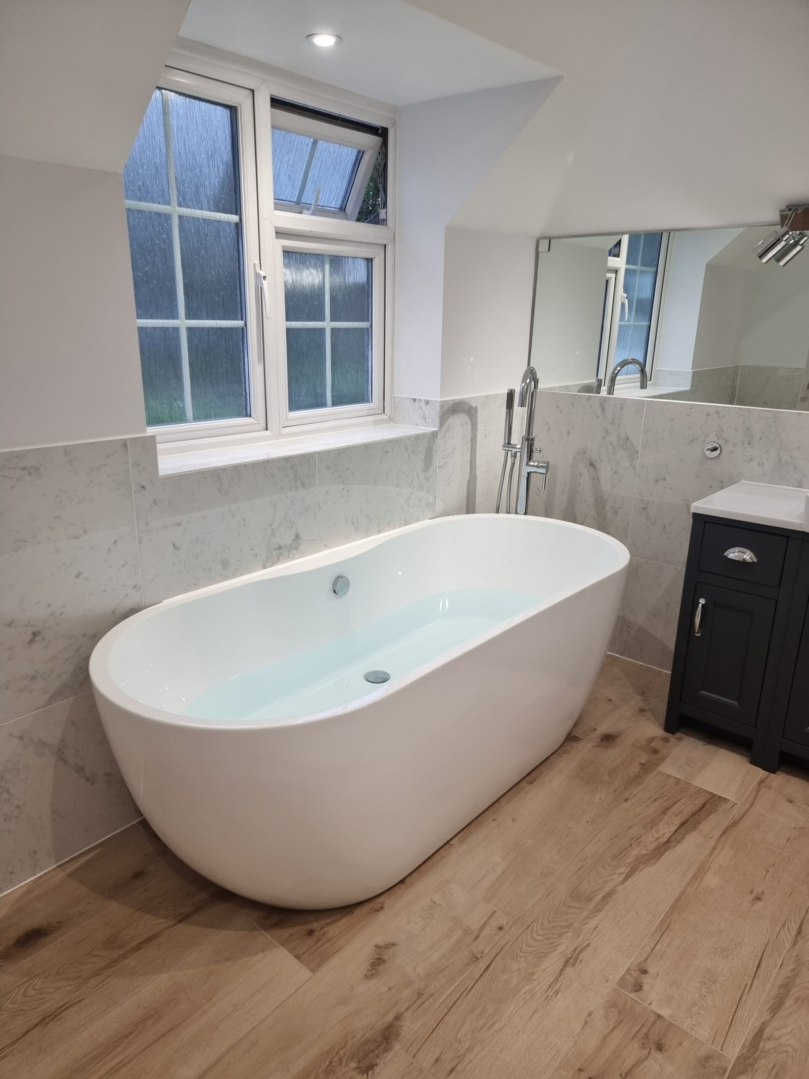 Family bathroom freestanding bath and vanity, North London