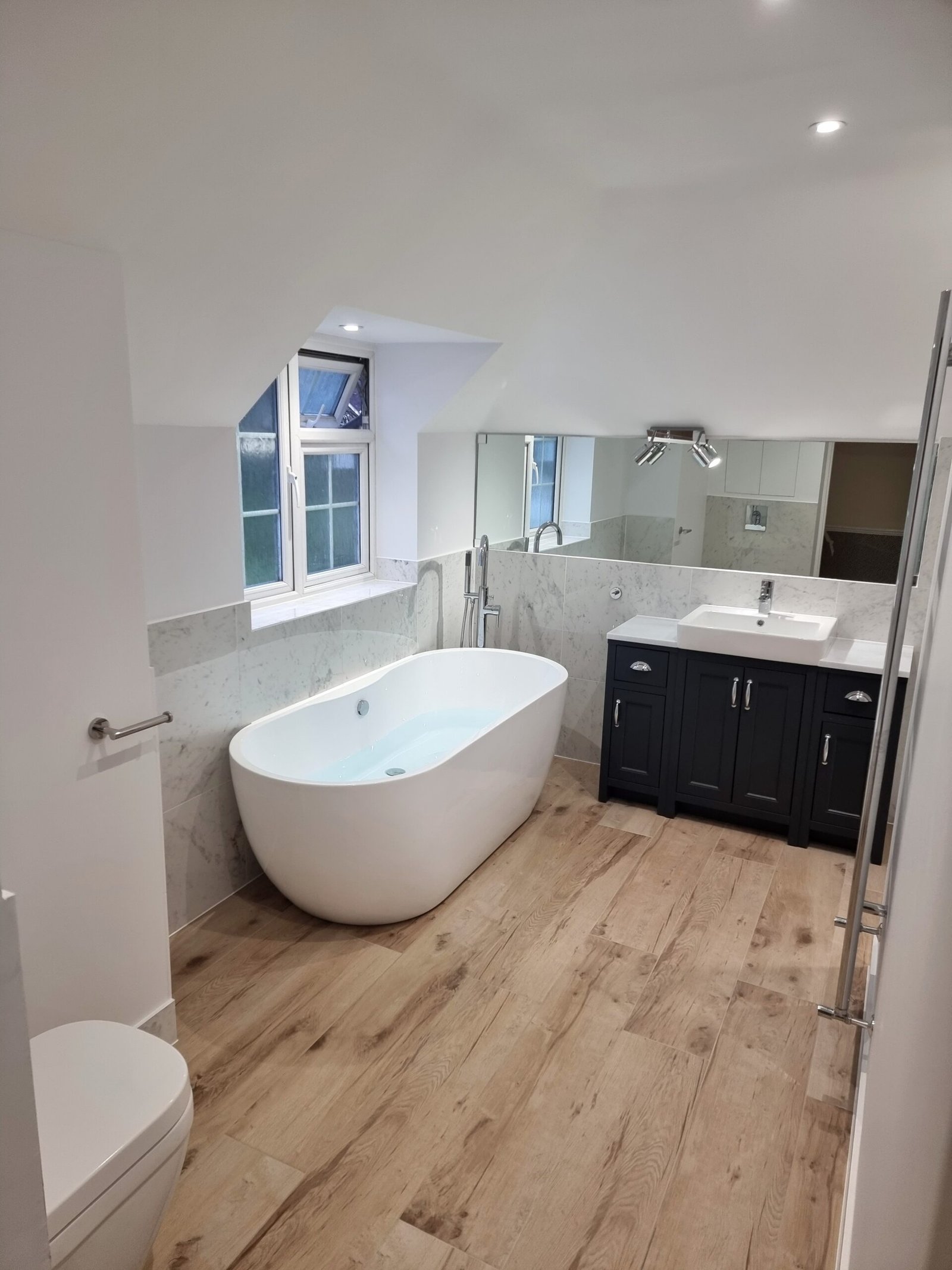 Family bathroom renovation in North London by Lucian Bathrooms