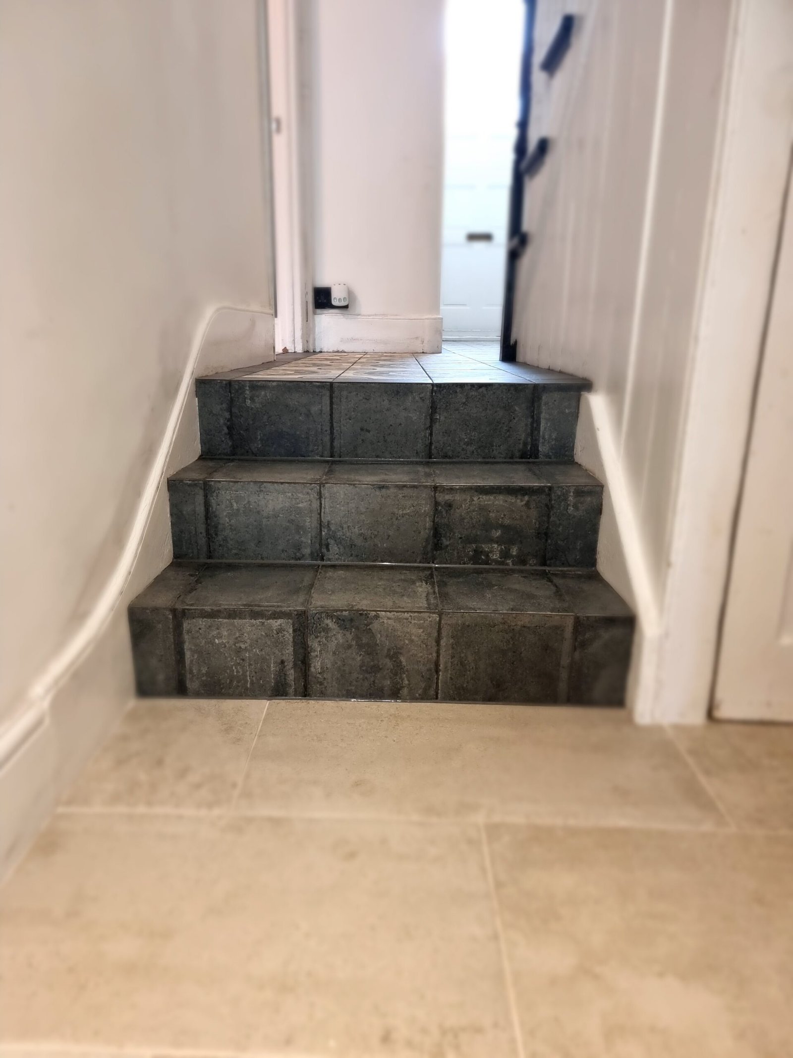 Mitred stair tiling