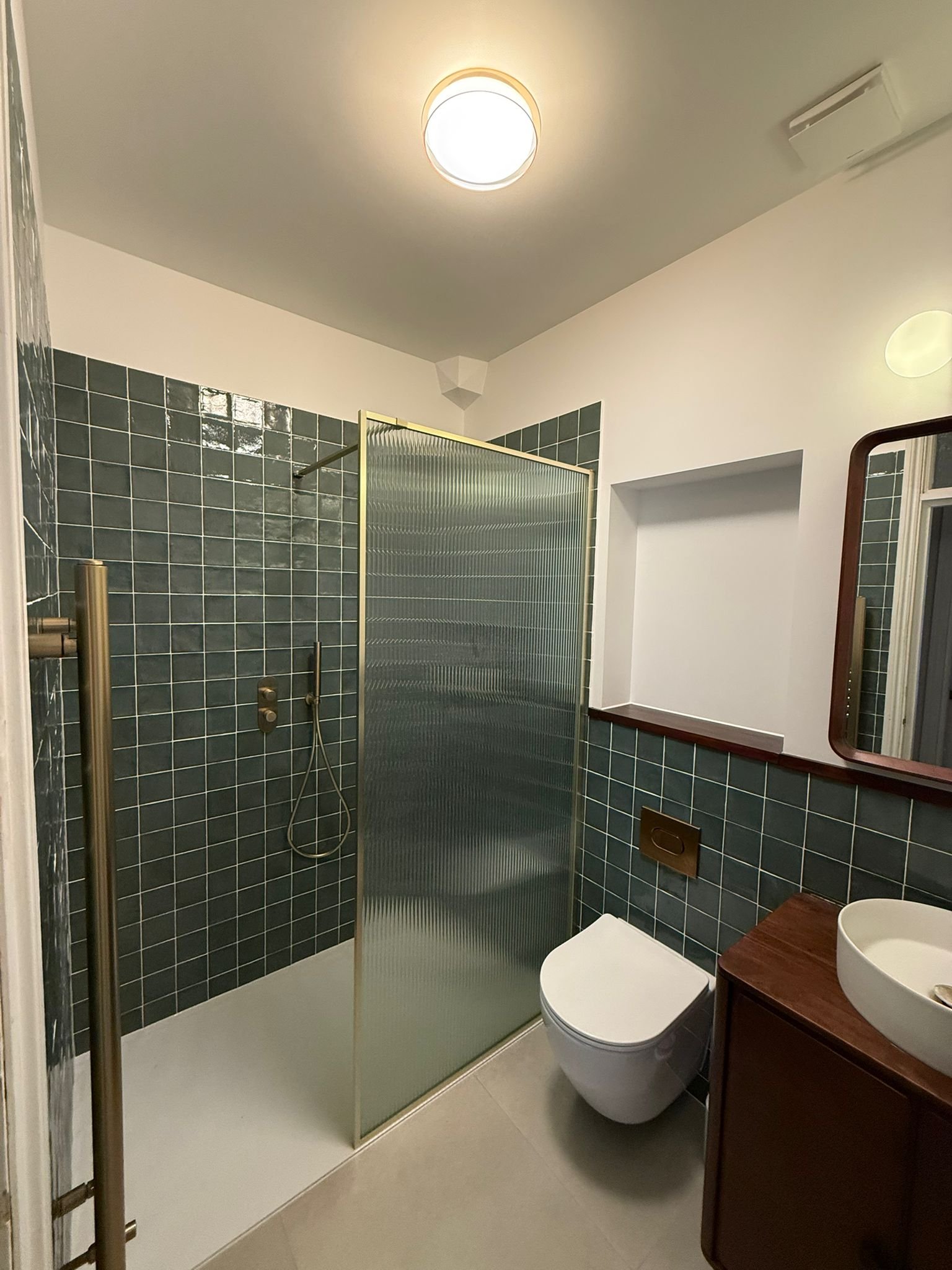 Walk-in shower renovation in North London by Lucian Bathrooms