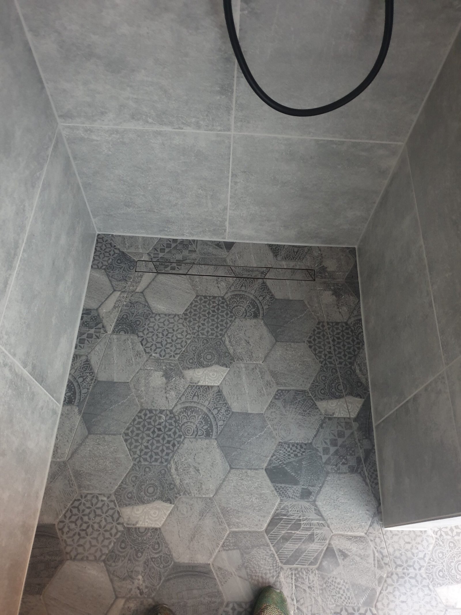 Wet room hexagon floor tiling