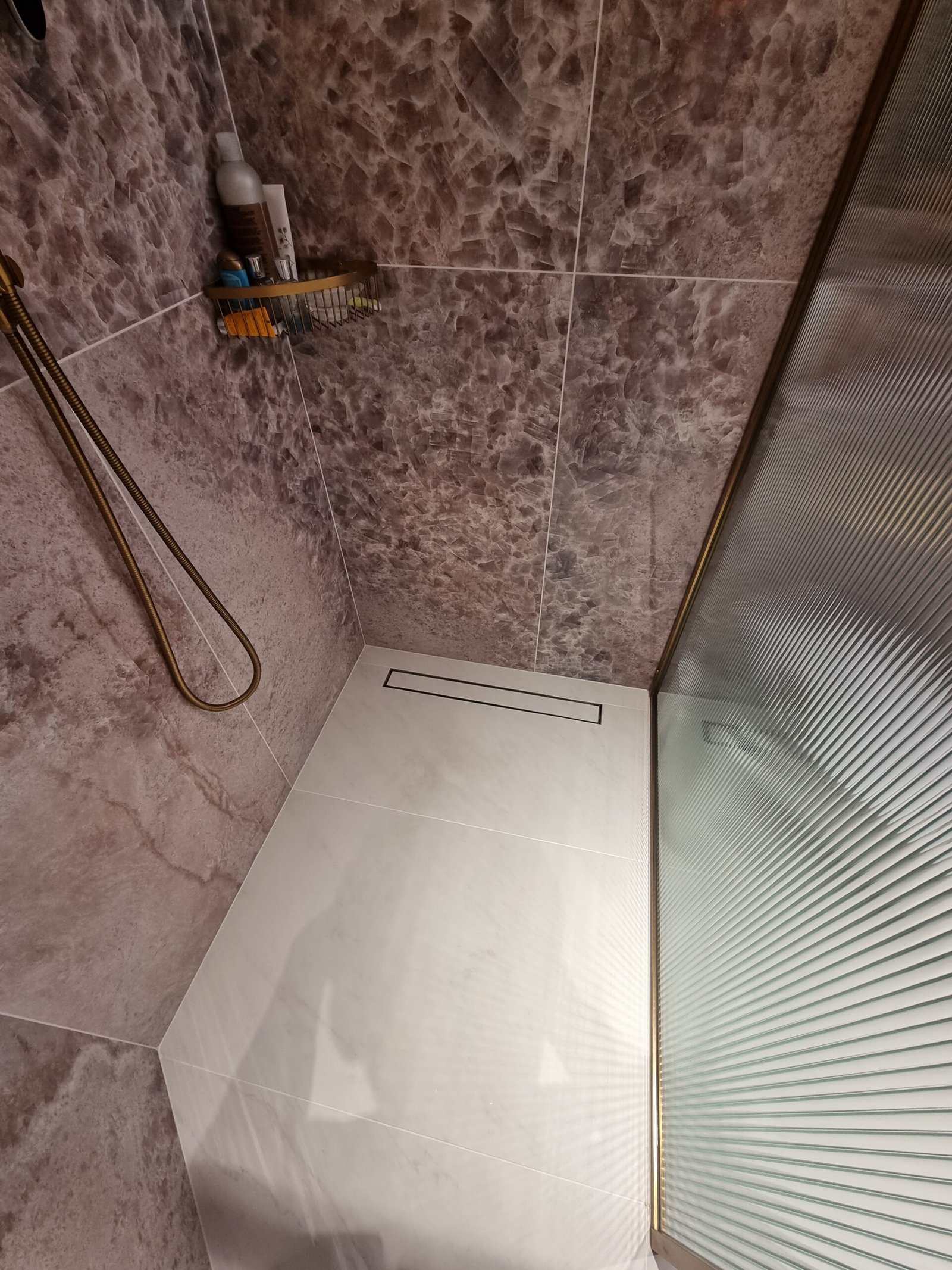 Walk-in shower wall and floor tiling with linear drain, Crouch End